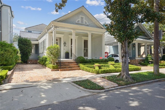 view of front of property featuring covered porch