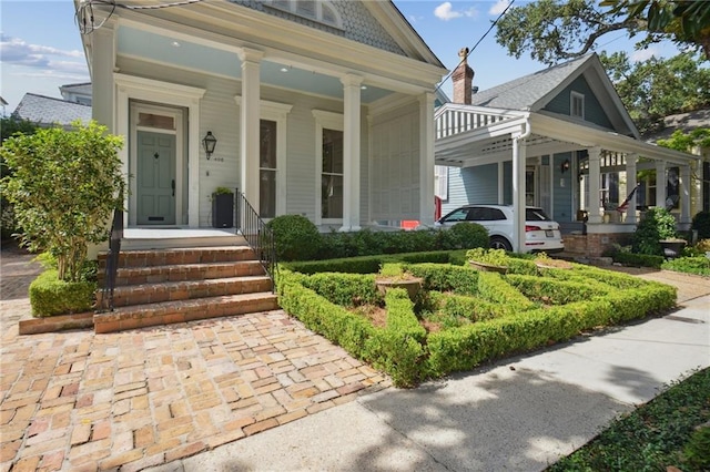 entrance to property with covered porch