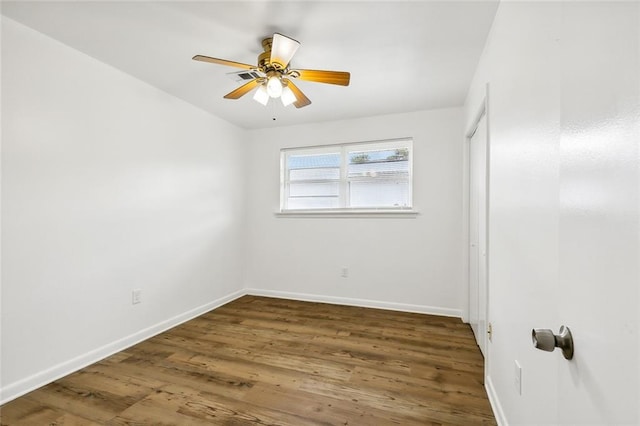 empty room featuring ceiling fan and wood-type flooring