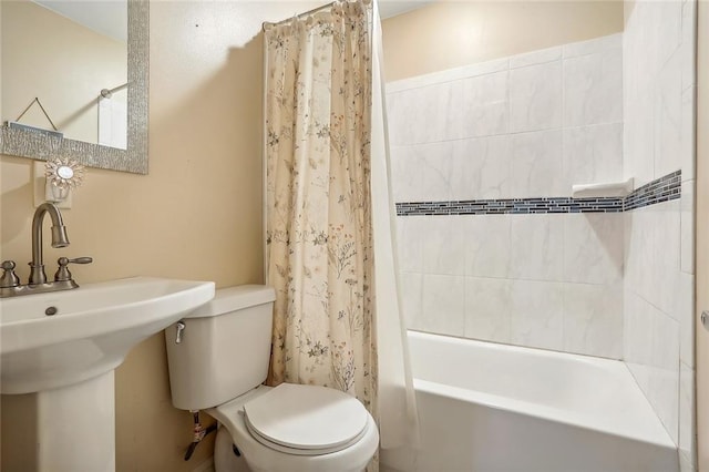 bathroom with toilet and shower / bathtub combination with curtain