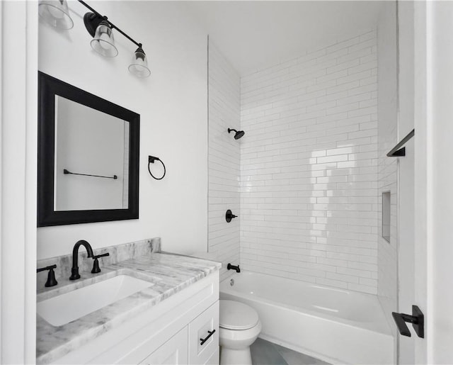 full bath with vanity, toilet, and  shower combination
