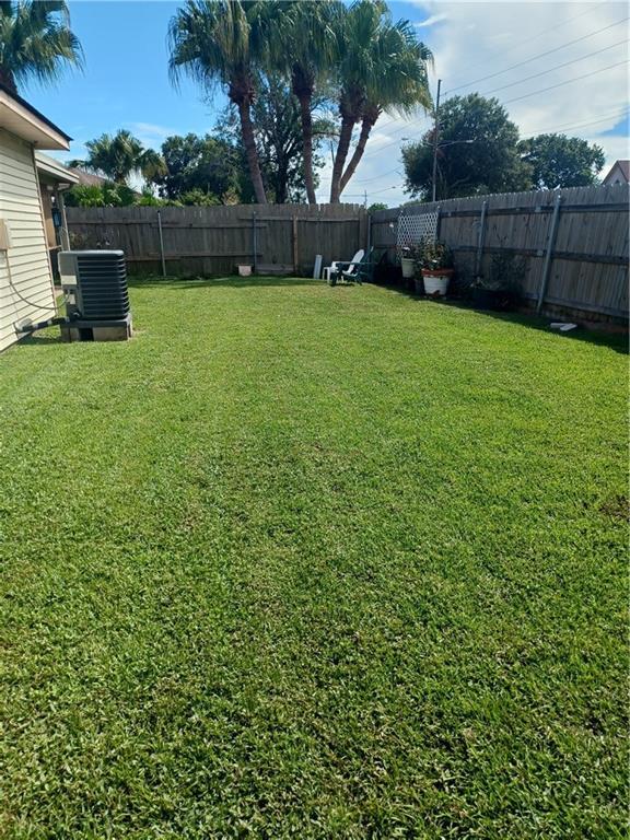 view of yard featuring cooling unit