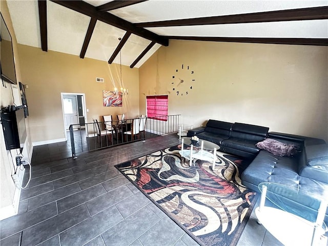 living room with high vaulted ceiling, dark tile patterned floors, and beam ceiling