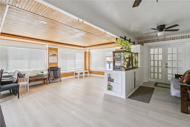 interior space featuring french doors, ceiling fan, wooden ceiling, and light hardwood / wood-style flooring