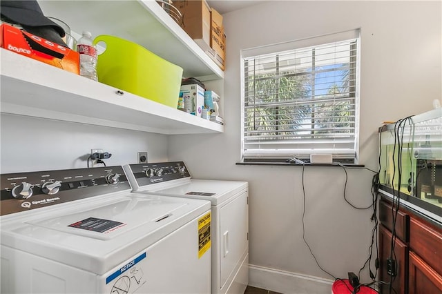 laundry room with washer and clothes dryer