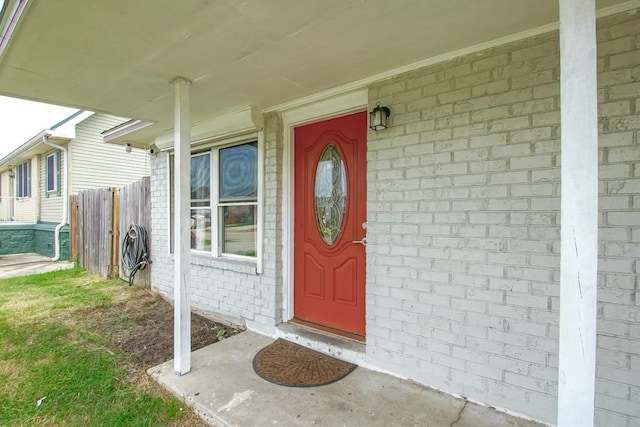 property entrance featuring a porch