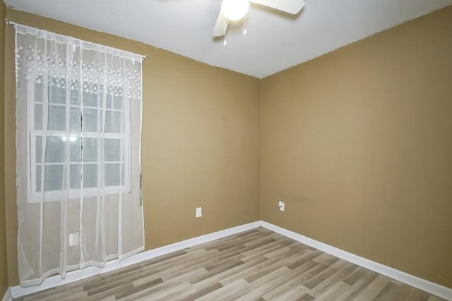 unfurnished room with ceiling fan and light hardwood / wood-style floors