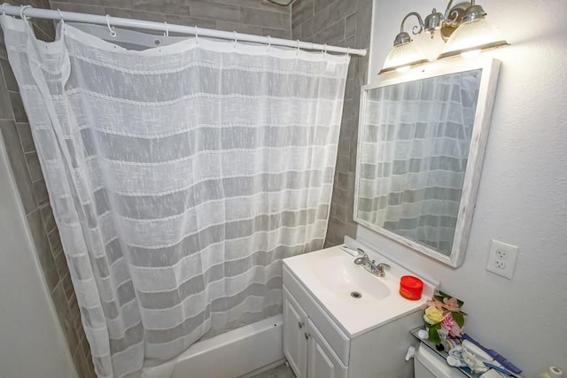 bathroom featuring vanity and shower / bath combo with shower curtain