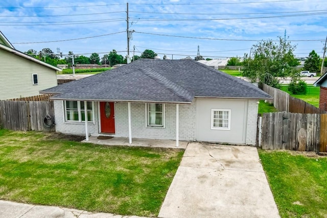 ranch-style house with a front yard