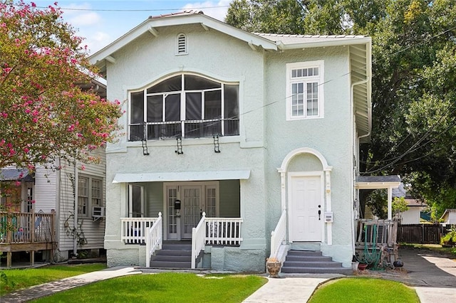 view of front of property featuring covered porch