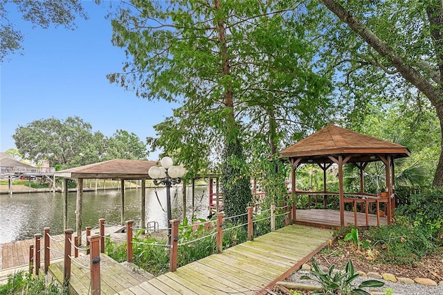 dock area featuring a water view