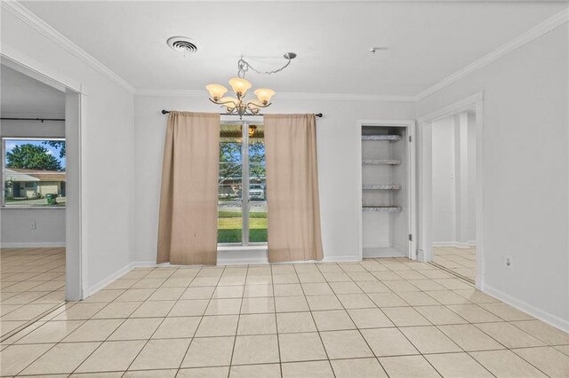 spare room featuring light tile patterned floors, a notable chandelier, and ornamental molding