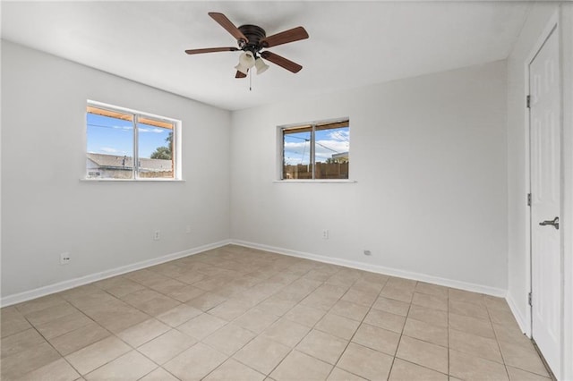 unfurnished bedroom featuring ceiling fan and light tile patterned floors