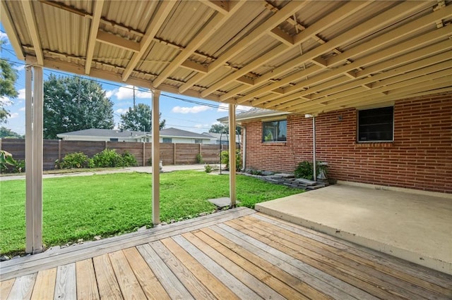 exterior space with a lawn and a patio area