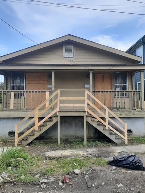 view of front of home featuring covered porch