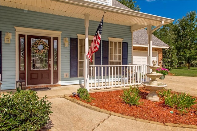 entrance to property with covered porch