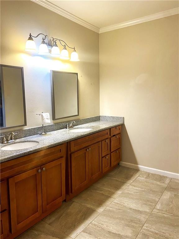 bathroom with tile patterned flooring, vanity, and ornamental molding