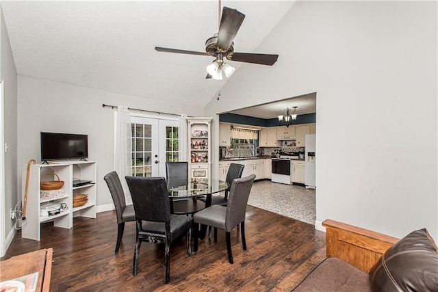 dining space with dark wood-type flooring, ceiling fan, high vaulted ceiling, and french doors