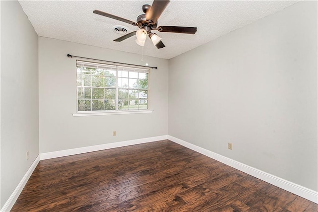 empty room featuring hardwood / wood-style floors, ceiling fan, and a textured ceiling