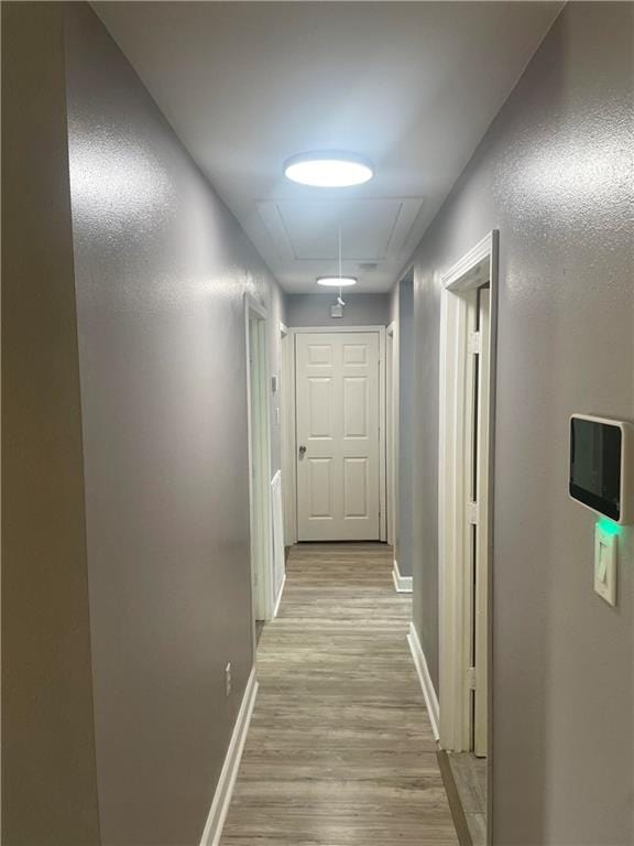 hallway featuring light wood-type flooring