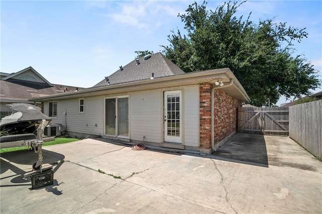 back of house featuring a patio