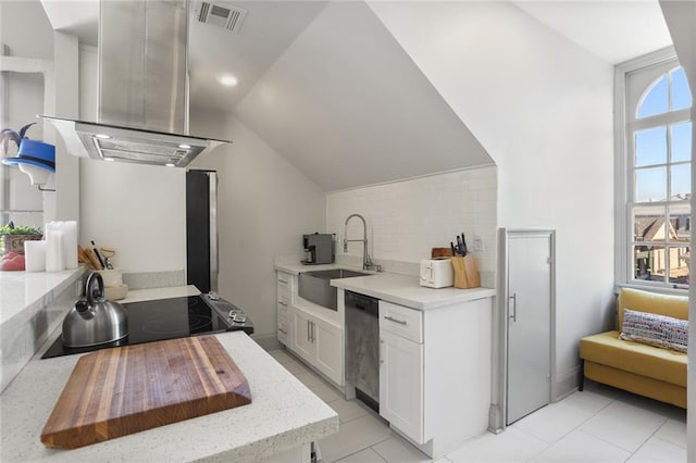 kitchen with white cabinets, sink, stainless steel dishwasher, island exhaust hood, and vaulted ceiling