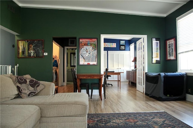 living room with light hardwood / wood-style floors