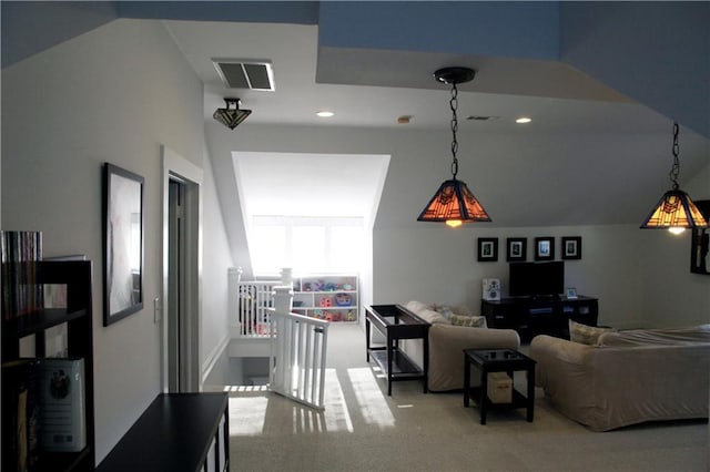 carpeted living room featuring lofted ceiling