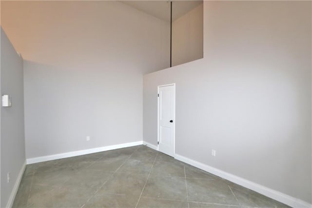 empty room featuring french doors and plenty of natural light