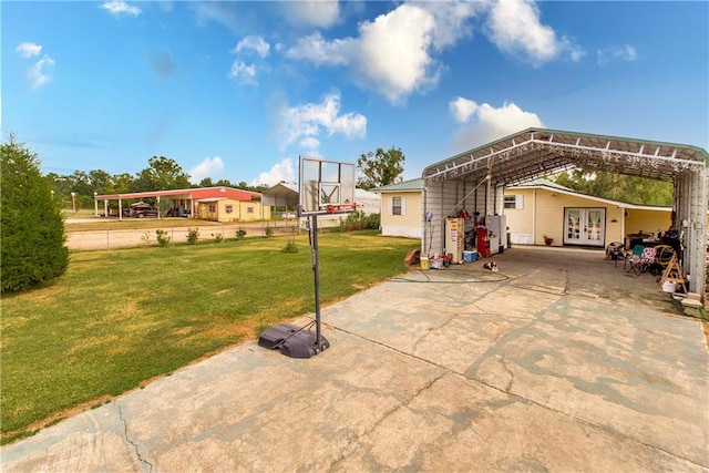 view of patio with french doors and a carport