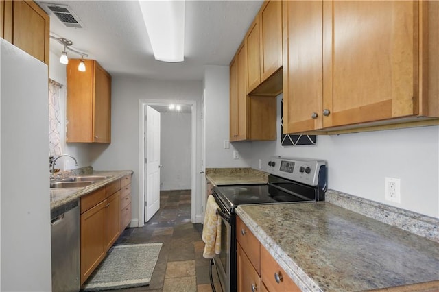 kitchen with stainless steel appliances and sink