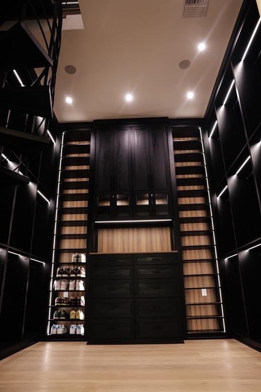 wine cellar featuring light hardwood / wood-style floors