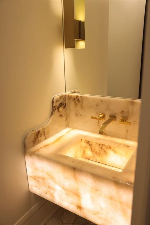 bathroom with tile patterned flooring