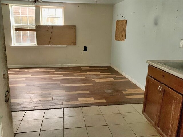 spare room with light hardwood / wood-style flooring