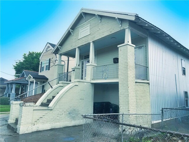 view of property exterior featuring a balcony