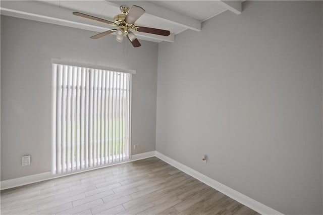 empty room with lofted ceiling with beams, light wood-type flooring, and ceiling fan