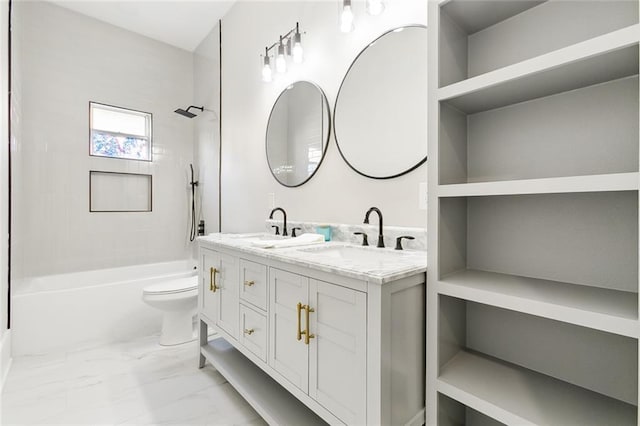 2634 St Ann St, New Orleans, LA 70119 - bathroom featuring marble look tiles, bathing tub / shower combination, double vanity, and toilet