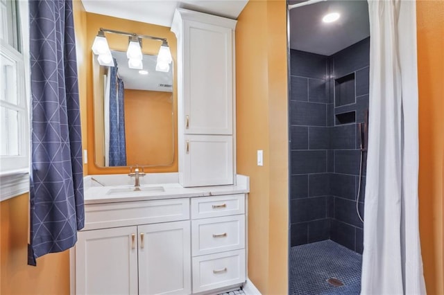 bathroom with vanity and walk in shower