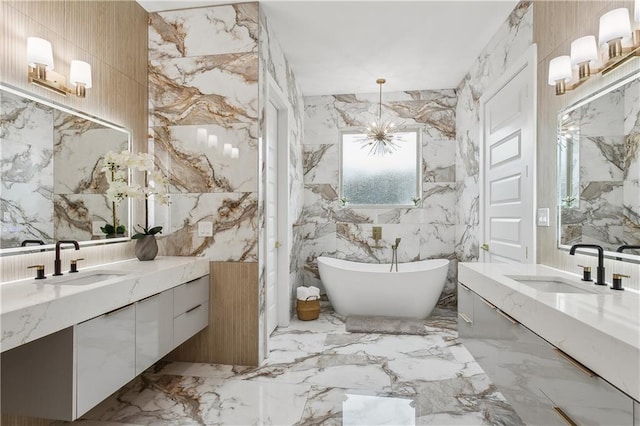 bathroom with tile walls, a bathtub, decorative backsplash, and vanity