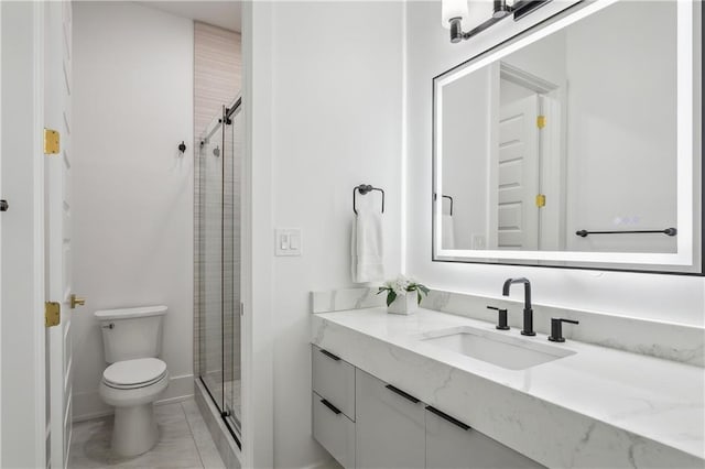 bathroom featuring vanity, toilet, and walk in shower