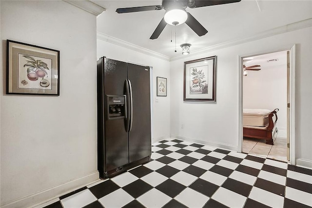 kitchen featuring black fridge, ceiling fan, and crown molding