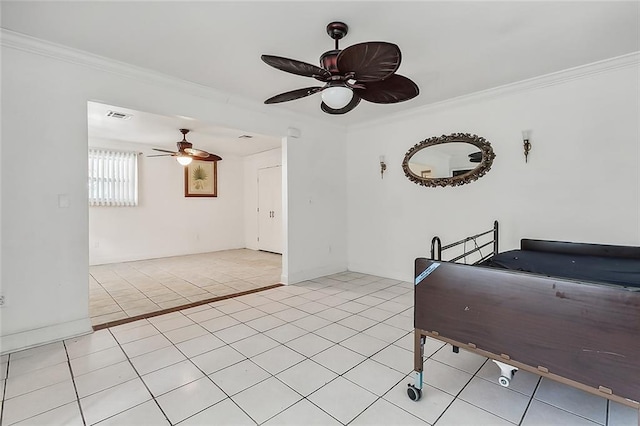 interior space featuring crown molding, light tile patterned floors, and ceiling fan