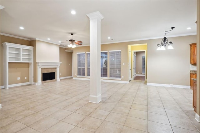 unfurnished living room featuring light tile patterned flooring, ceiling fan with notable chandelier, decorative columns, and ornamental molding