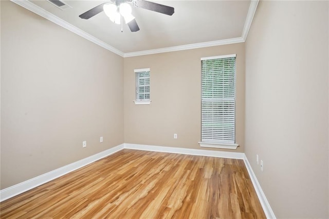 unfurnished room with crown molding, ceiling fan, and hardwood / wood-style flooring