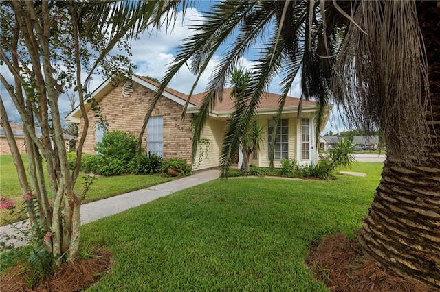 view of front of property with a front lawn