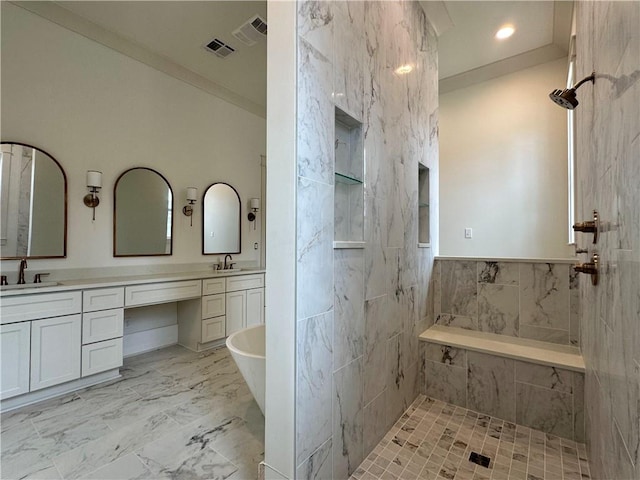 bathroom featuring vanity and separate shower and tub