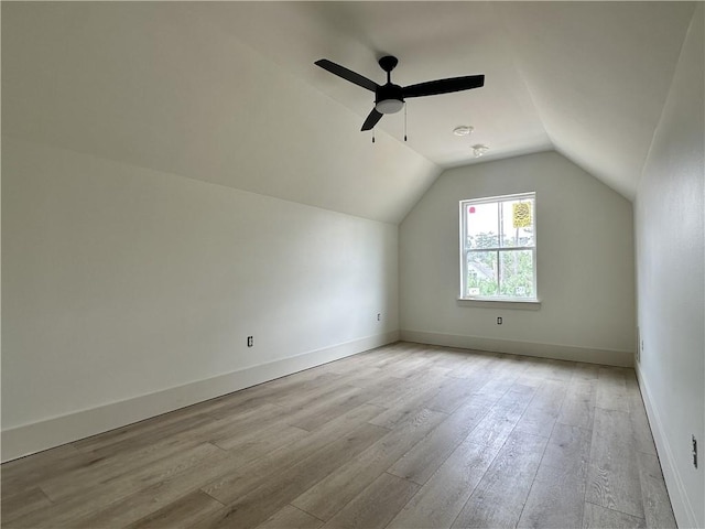 bonus room featuring ceiling fan, light hardwood / wood-style flooring, and lofted ceiling