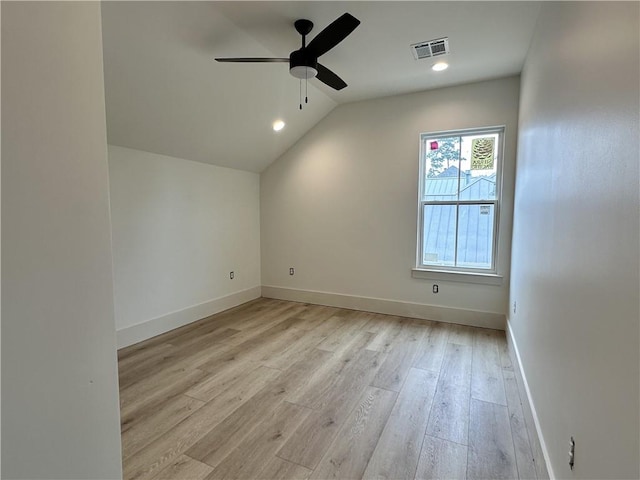 additional living space with ceiling fan, vaulted ceiling, and light hardwood / wood-style floors