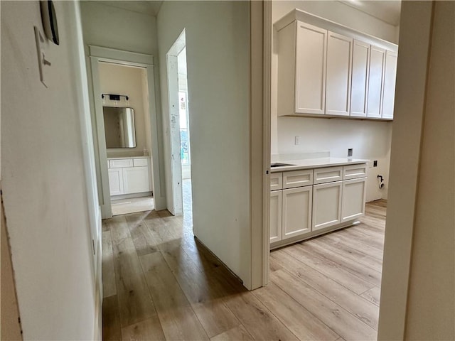 hallway featuring light hardwood / wood-style flooring