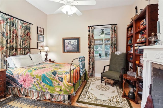 bedroom featuring ceiling fan and wood-type flooring